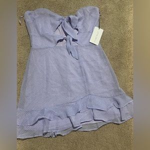 Ruffle tie front / zipper back ruffle bottom mini dress lilac polka dot